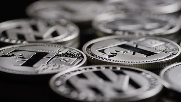 Rotating shot of Bitcoins  alt