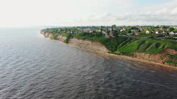 Old Brick Christian Church on the Field Near the River in the Village - Rock Cliff alt