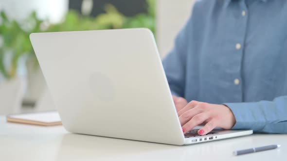 Close up Shot of Woman Typing on Laptop Keypad alt