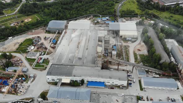Aerial view of big factory producing metal works. Metallurgy manufacture workshops alt