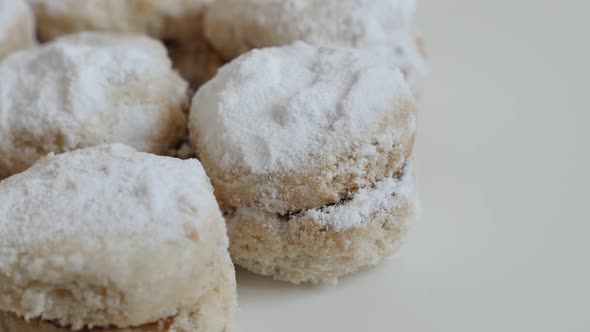 Panning over Serbian vanilice holiday cookies close-up 4K 2160p 30fps UltraHD footage - Little vanil alt