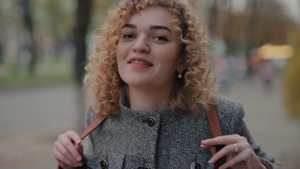 Happy Woman Smiling Funny at Camera