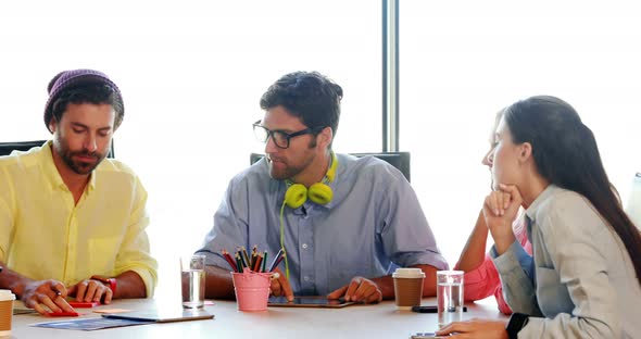 Businesspeople having a discussion alt