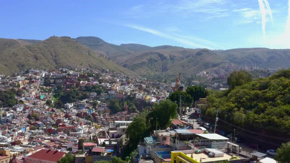 AERIAL: Guanajuato City and The Pipila, Mexico (Flying By) alt