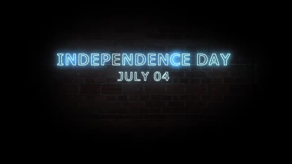 Independence day. Text neon light on brick wall background.