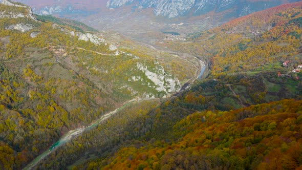 steep green mountains, deep forest and mountain road, beautiful valley and river alt