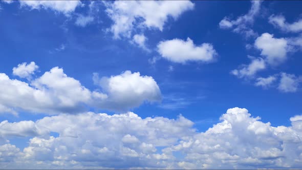 Timelapse Movement of Blue Clouds on a Sunny Day