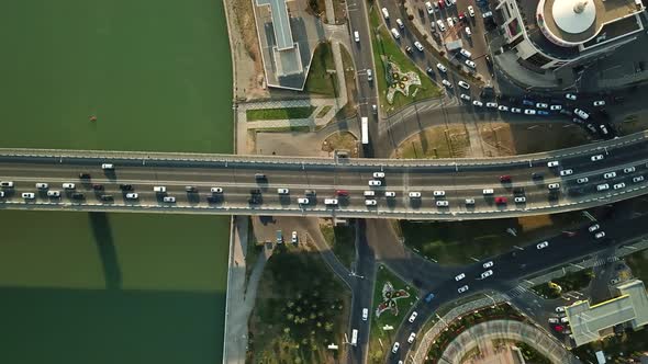 Aerial Top Down View From Drone of Traffic Bridge City with Driving Car alt