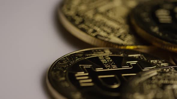 Rotating shot of Bitcoins  alt