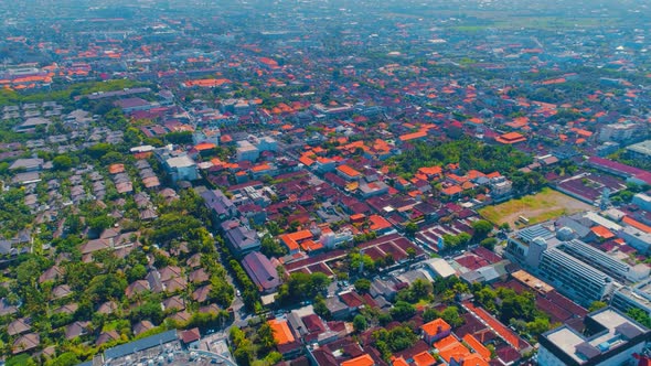 Aerial View Of The Rooftops Of A City In Bali alt