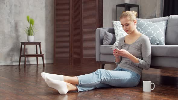 Young woman is resting at home alt