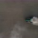 Drone footage of green tractor working in a fields. - VideoHive Item for Sale