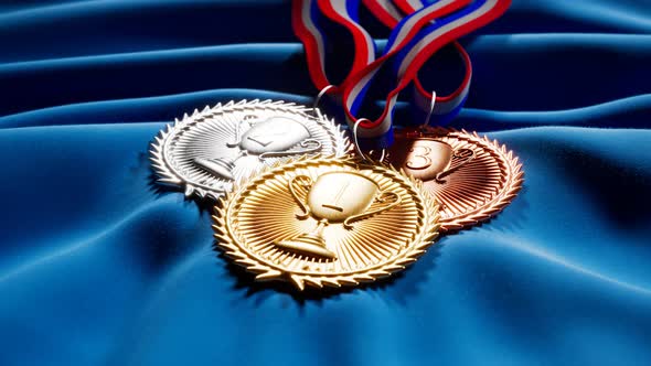 Set of gold, silver and brown medals for winners. First three prizes. Trophies. alt