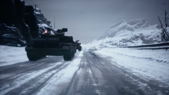 A Tank Convoy Stands On A Deserted Winter Road