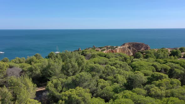 Delightful Aerial View of Portuguese Rocky Beaches Near the City of Portimao alt