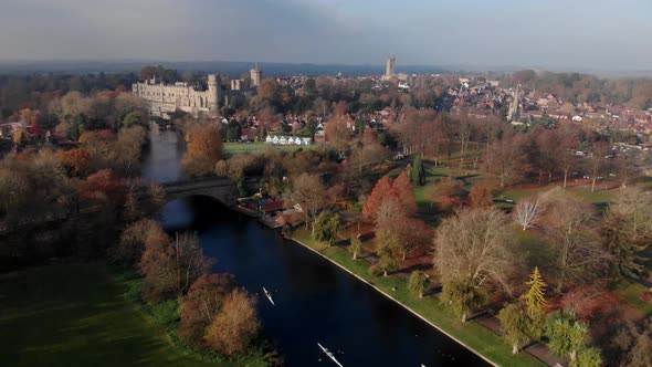 Warwick Town England, Aerial Drone View Of Park, River Avon, Churches And Castle In Autumn