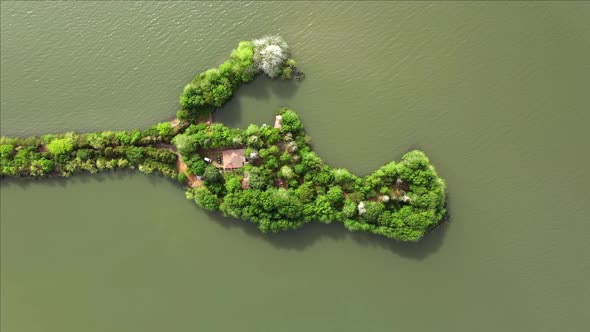 Aerial view of drone of a beautiful small island in the lake