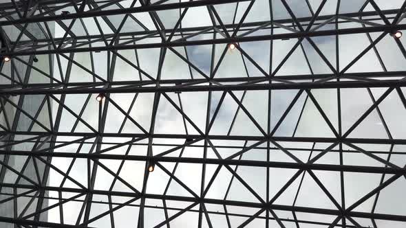 Glass Roof of a Modern Building. Overlapping Roof Building
