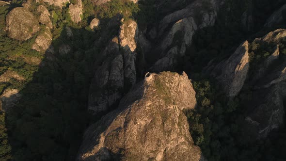 Flying Over the Sharp Rocks with Ancient Little Fortress in Georgia