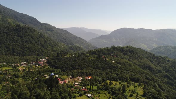 Yuksom village in Sikkim state in India seen from the sky alt