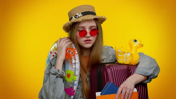 Displeased Tired Boring Traveler Tourist Teen Stylish Girl in Summer Clothes on Yellow Background alt