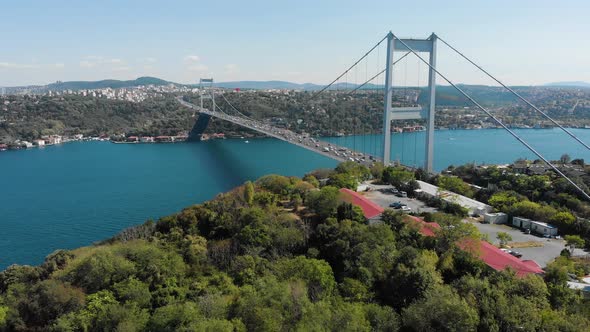 Aerial view of Fatih Sultan Mehmet Bridge and car traffic alt