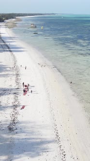 Vertical Video Boats in the Ocean Near the Coast of Zanzibar Tanzania alt