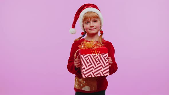 Funny Teen Toddler Girl Kid Wears Red Christmas Sweater Presenting Christmas Gift Box Shopping Sale alt