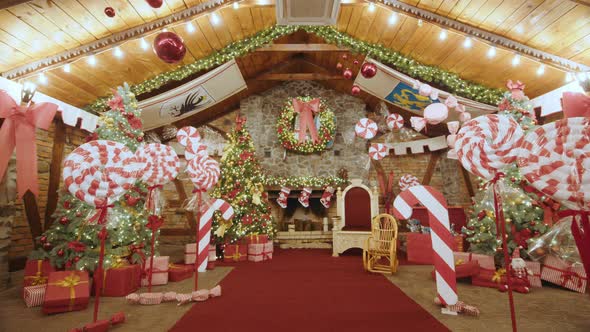 Christmas Big House Lots of Christmas Trees and Candies alt