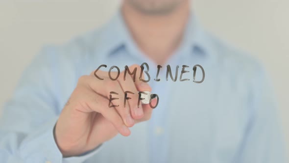 Combined Effort, Man Writing on Transparent Screen alt