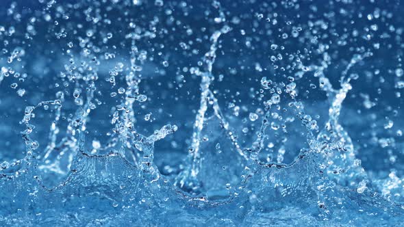 Super Slow Motion Shot of Linear Water Splash at 1000Fps alt