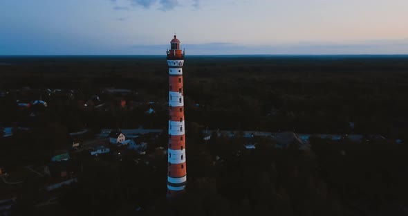 Old Active Lighthouse, Gloomy Sky and Cold Blue Atmosphere, Beach, North Misty Sea in Vintage alt