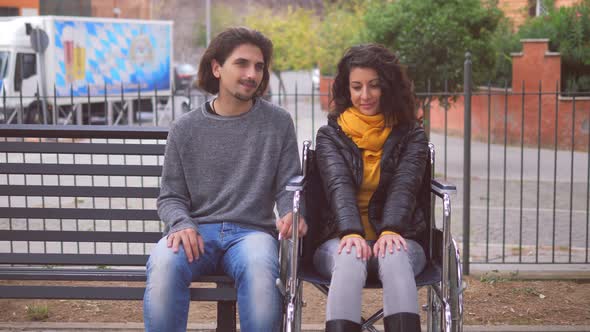 first kiss -shy man takes the initiative and kisses his friend with a disability alt