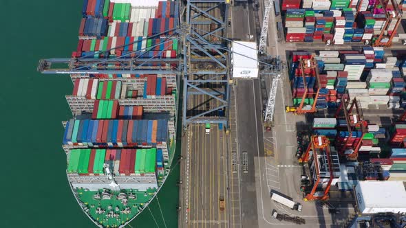 Top view of cargo ship in the port in Hong Kong alt