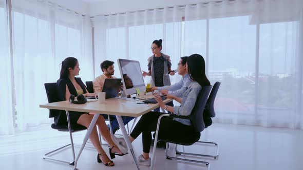 Senior Leader Giving Advice Speech to Team Members alt