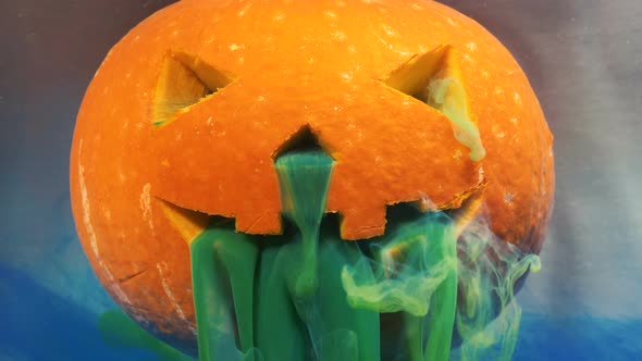 Special Green Paint Pours Covering Pumpkin Mouth and Nose alt