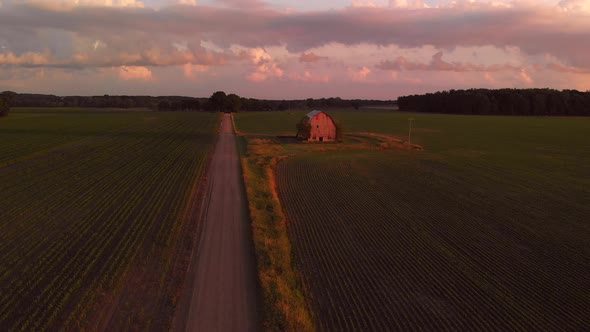  Rural Landscape With Old Abandoned Barn At Sunset, Aerial View