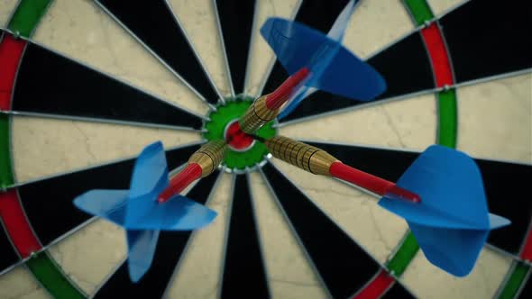 Darts In Bullseye Moving Shot alt