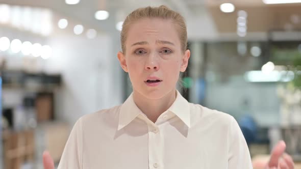 Portrait of Upset Young Businesswoman Reacting to Loss Failure alt