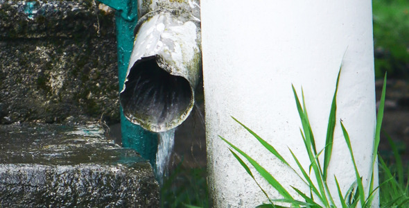 Water Flows From The Downspout 2