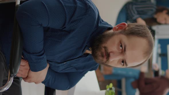 Video Vertical Sad Immobilized Businessman Looking at Camera Upset alt