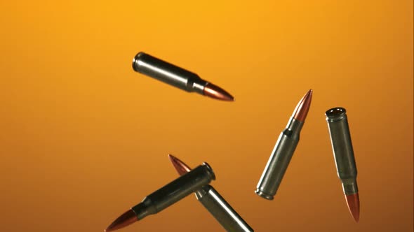Bullets falling bouncing in ultra slow motion  alt