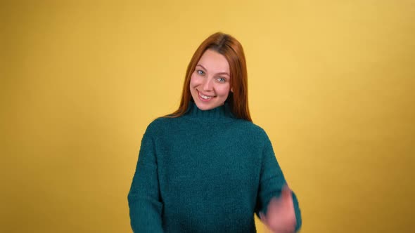 Young Red Hair Woman Posing Isolated on Yellow Color Background Studio alt