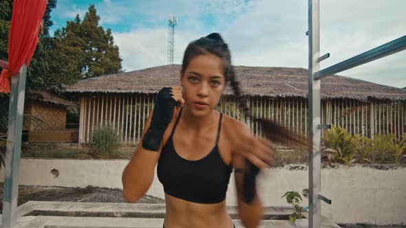 Woman Fighter Trains Her Punches Training Day in the Abandoned Hotel Strength Fit Body alt