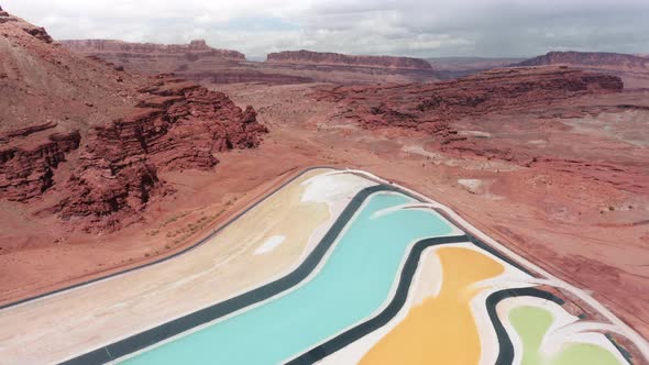 Bird Eye View Red Rock Desert Landscape Salt Evaporation Industrial Site Ponds alt