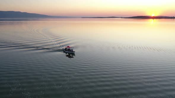 Fishing boat on lake at sunset golyazi, bursa turkey alt