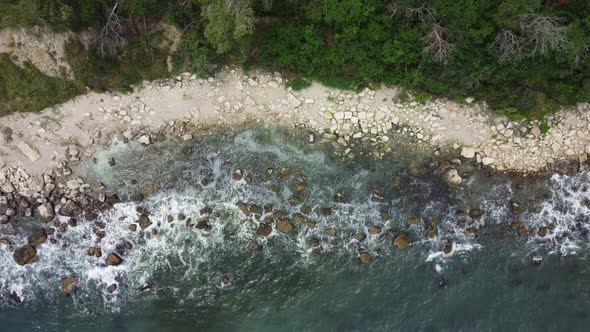 Aerial View of Sea Waves and Fantastic Cliffs Rocky Coast alt
