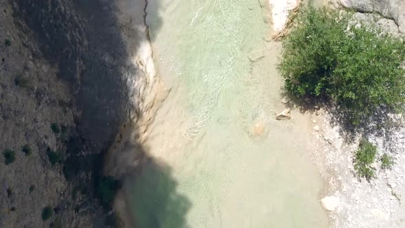 Aerial View Over River In Mountains alt