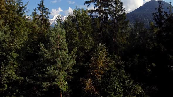 Flying upwards to reveal a beautiful mountain range landscape. Montblanc, highest mountain in Europe alt