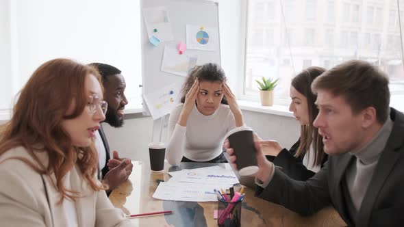 Employees in the Office Swear Over Poor Business Results alt